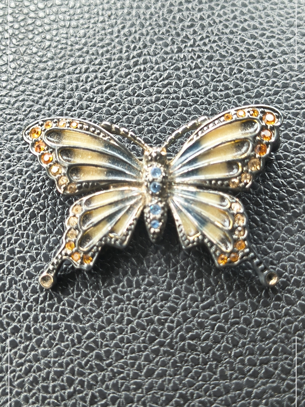 Monet Gold-Tone Butterfly Brooch with Blue and Amber Stones